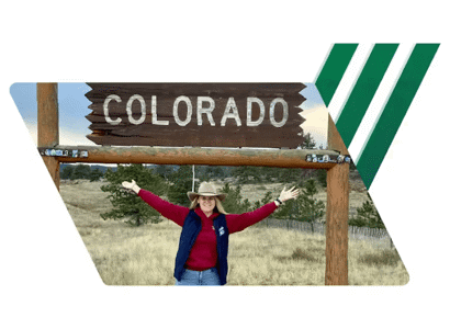 Sioned Davies under a Colorado sign