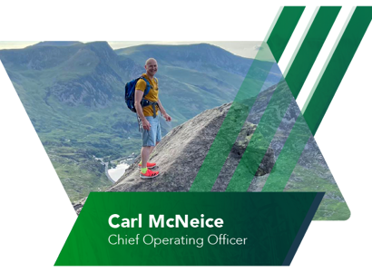 Chief Operating Officer, Carl McNeice on a mountain